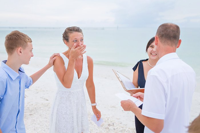 vow renewal with children on the beach