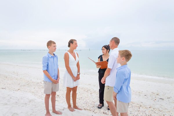 vow renewal on the beach with children