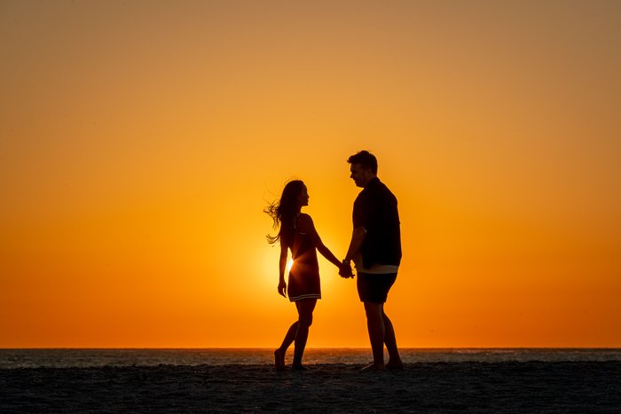 wedding couple at sunset on Naples beach